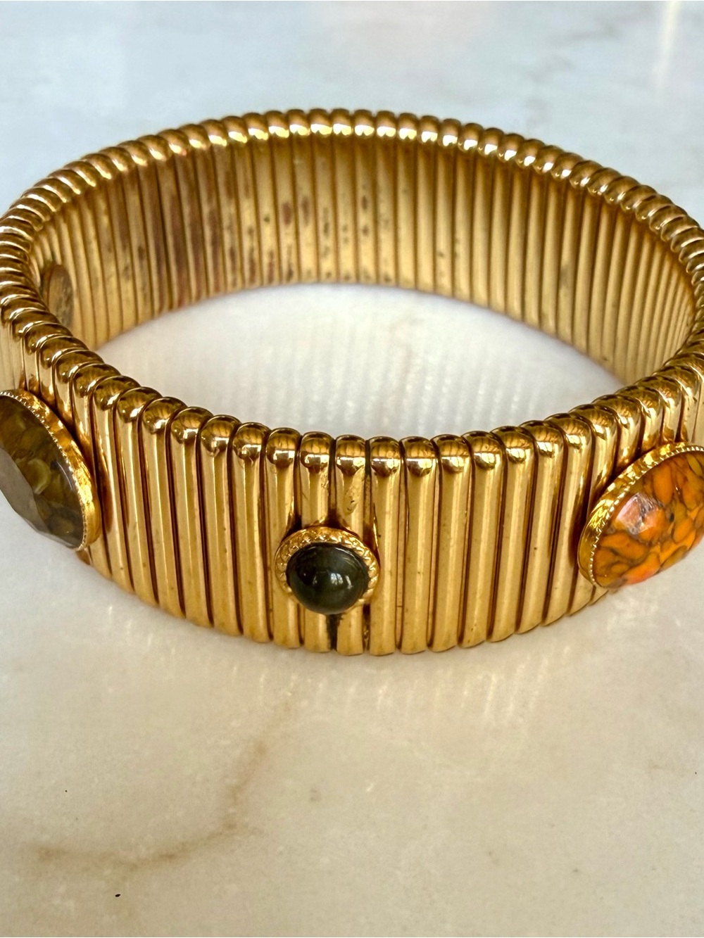 Gold Ribbed Stretch Bracelet with Green and Orange Stone Accents
